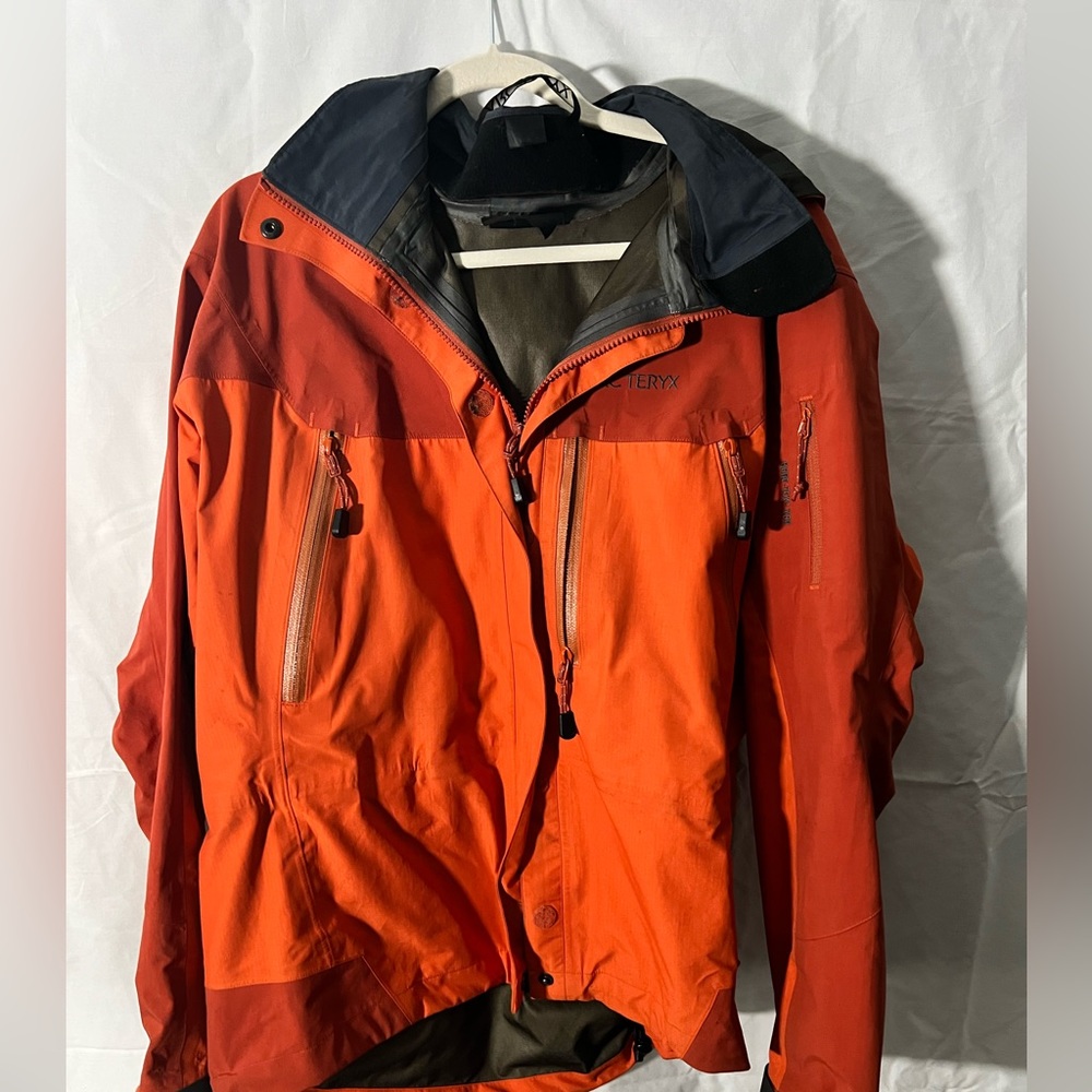 Large women Arcteryx gortex coat in orange